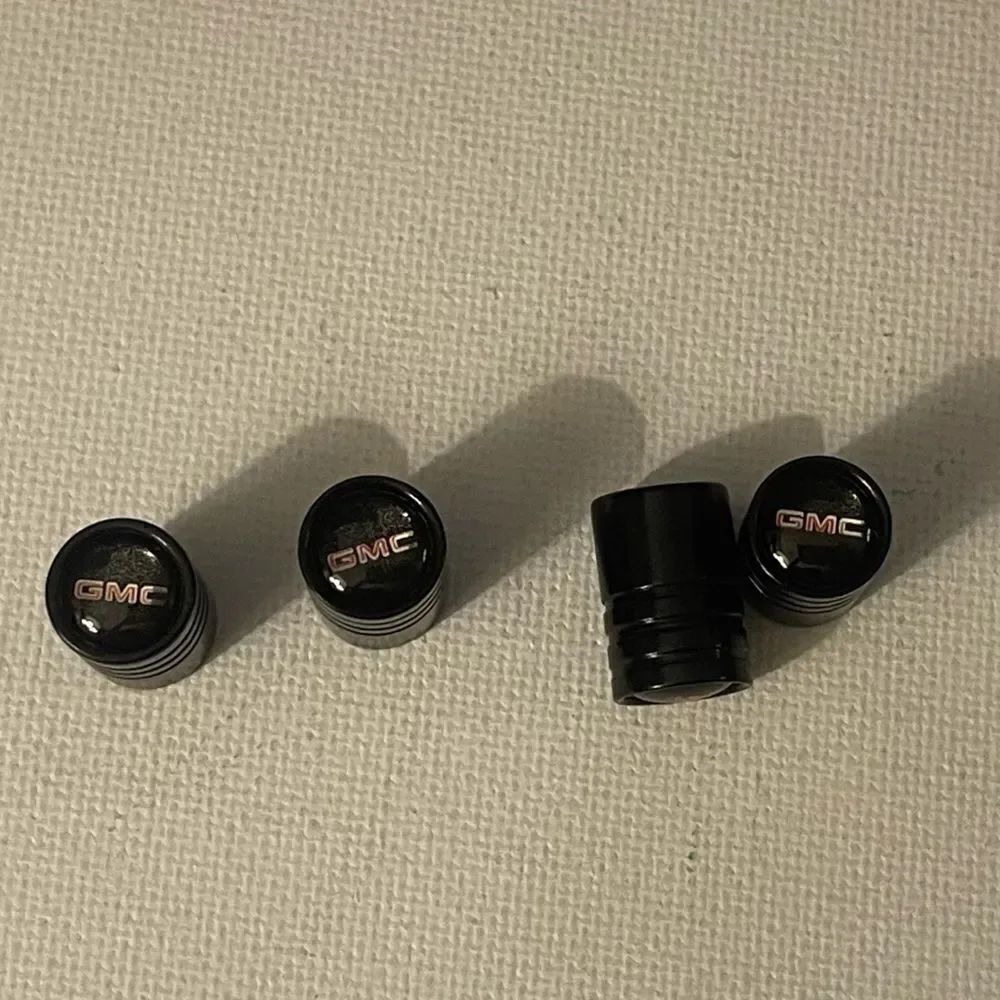 GMC Logo valve Stem caps in Black set of 4 NWT